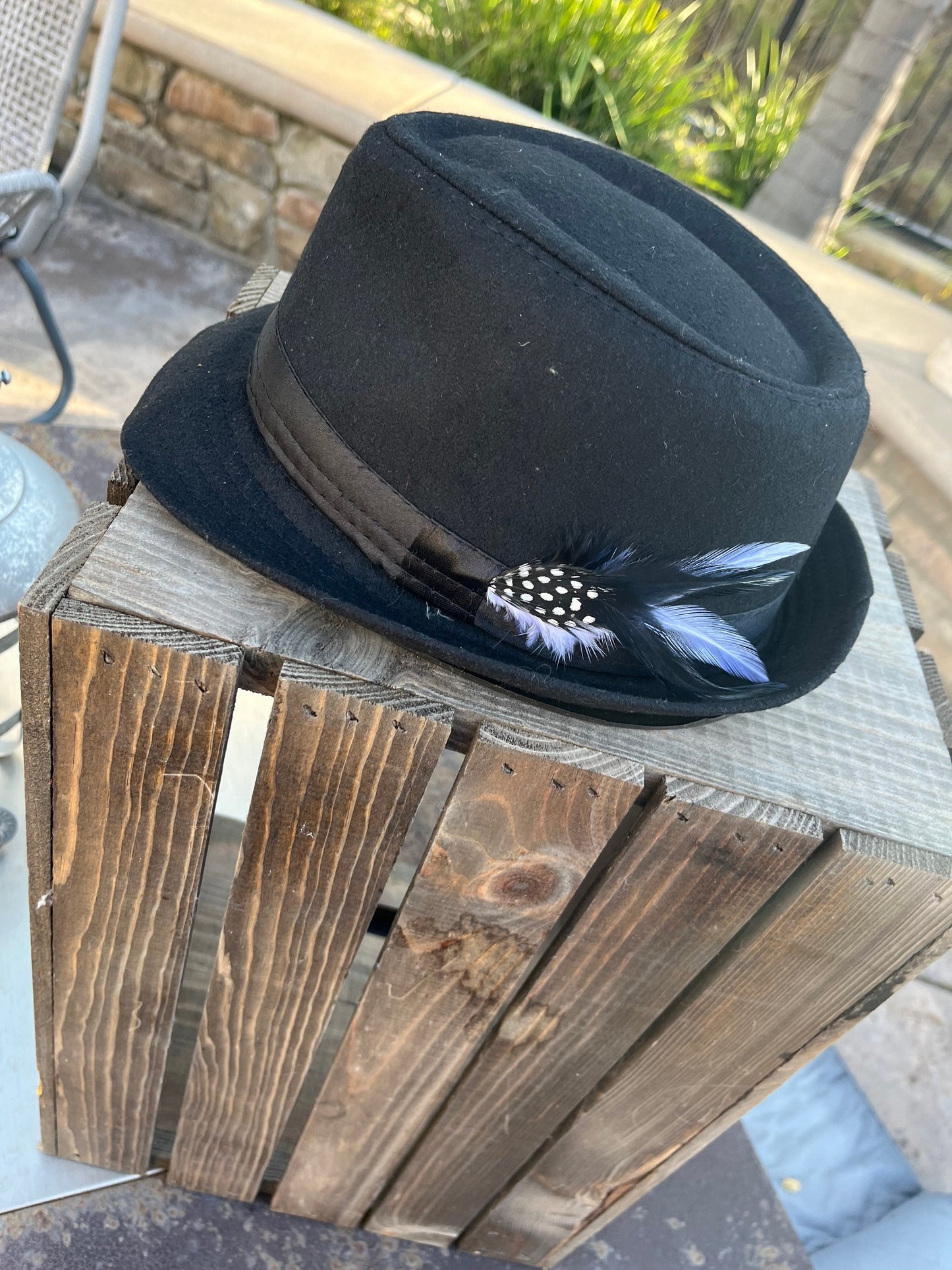 Men’s/unisex black fedora satin band with red, black, and white feather