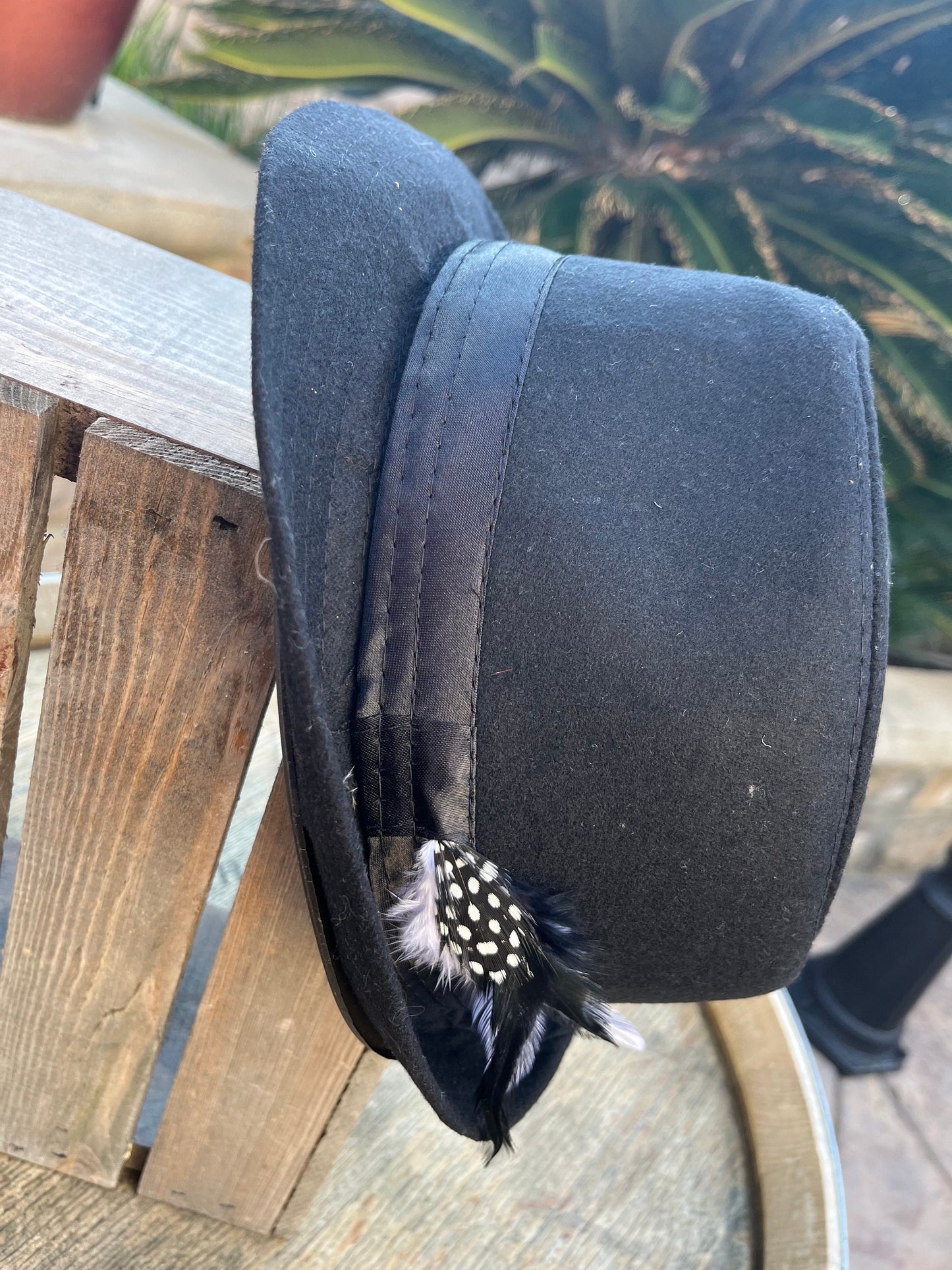 Men’s/unisex black fedora satin band with red, black, and white feather