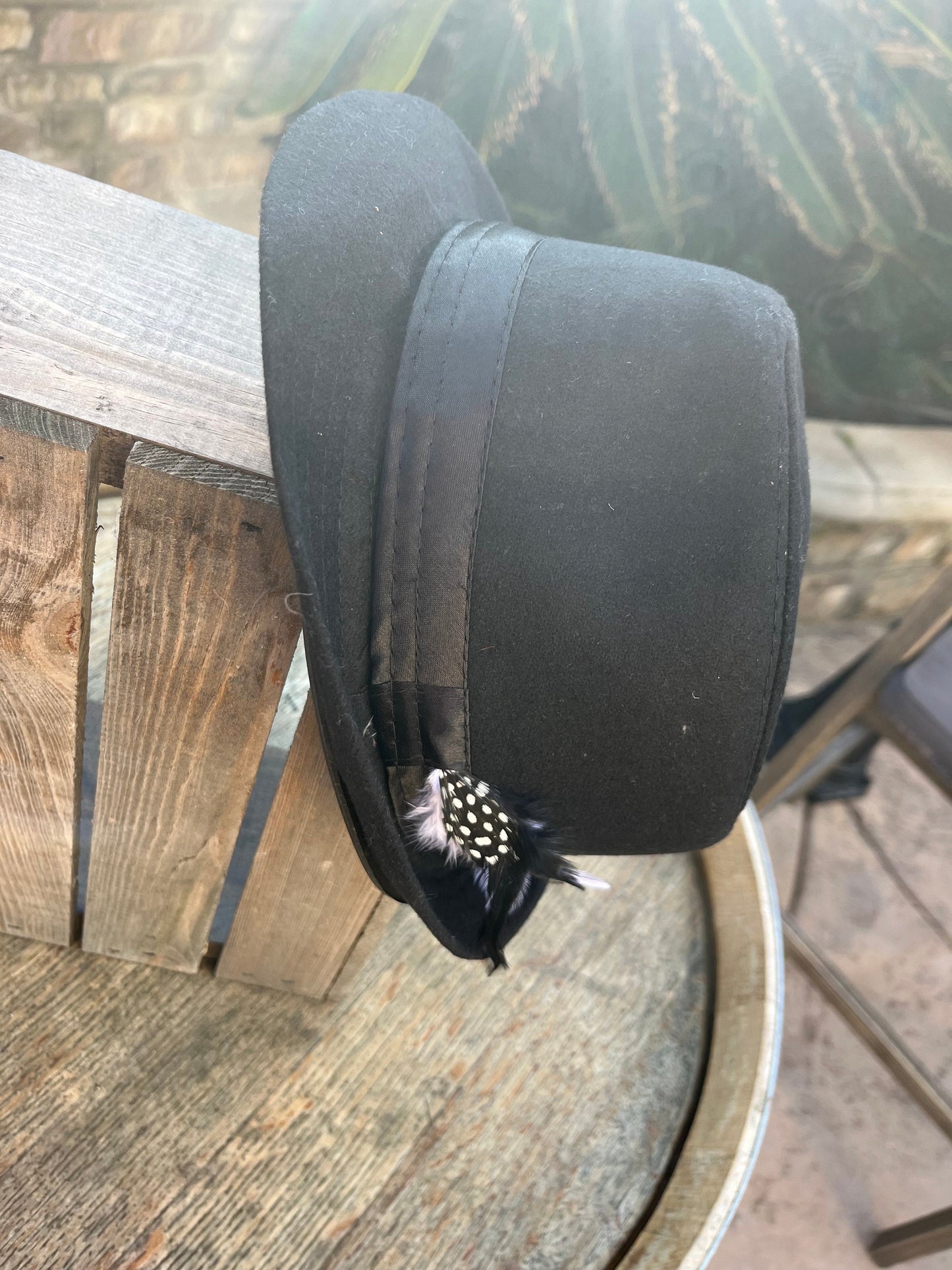 Men’s/unisex black fedora satin band with red, black, and white feather